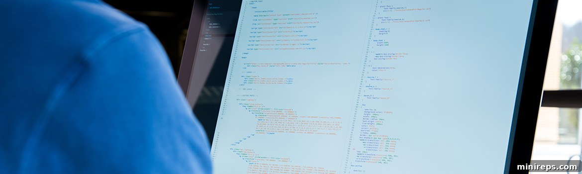 Two developers collaborating on code, illustrating the collaborative nature of web development projects.